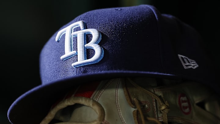 Apr 3, 2023; Washington, District of Columbia, USA; A general view of a Tampa Bay Rays hat and glove during the seventh inning of the game against the Washington Nationals at Nationals Park. 