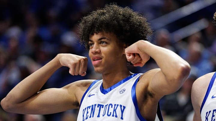 Oct 24, 2025; Lexington, KY, USA; Kentucky Wildcats forward Braydon Hawthorne (22) gestures in celebration from the bench during the second half against the Purdue Boilermakers at Rupp Arena at Central Bank Center. Mandatory Credit: Jordan Prather-Imagn Images