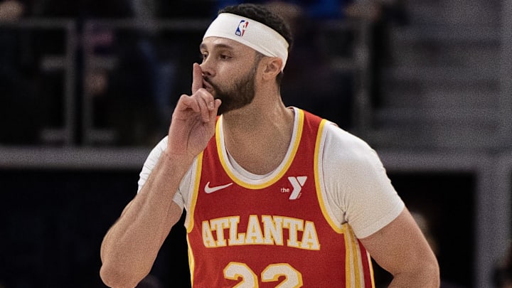 Nov 8, 2024; Detroit, Michigan, USA; Atlanta Hawks forward Larry Nance Jr. (22) runs up court after shushing slam dunking the ball against the Detroit Pistons during the second half at Little Caesars Arena. Mandatory Credit: David Reginek-Imagn Images