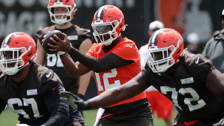 Browns quarterback Shedeur Sanders takes a snap during minicamp, Tuesday, June 10, 2025, in Berea.