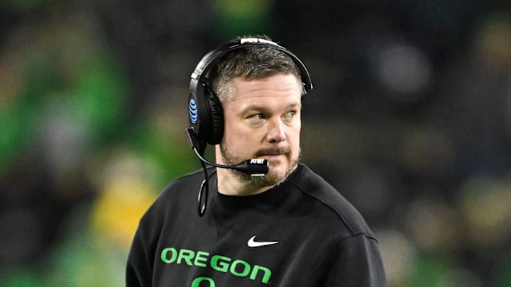 Dec 20, 2025; Eugene, OR, USA;  Oregon Ducks head coach Dan Lanning looks on during the fourth quarter against the James Madison Dukes at Autzen Stadium. Mandatory Credit: Craig Strobeck-Imagn Images