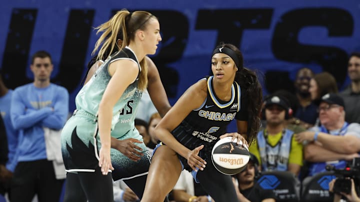 Jun 4, 2024; Chicago, Illinois, USA; Chicago Sky forward Angel Reese (5) controls the ball against the New York Liberty during the first half of a WNBA game at Wintrust Arena. Mandatory Credit: Kamil Krzaczynski-USA TODAY Sports