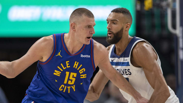 May 10, 2024; Minneapolis, Minnesota, USA; Denver Nuggets center Nikola Jokic (15) controls the ball as Minnesota Timberwolves center Rudy Gobert (27) defends in the second half during game three of the second round for the 2024 NBA playoffs at Target Center. May 10, 2024; Minneapolis, Minnesota, USA; Denver Nuggets center Nikola Jokic (15) controls the ball as Minnesota Timberwolves center Rudy Gobert (27) defends in the second half during game three of the second round for the 2024 NBA playoffs at Target Center.