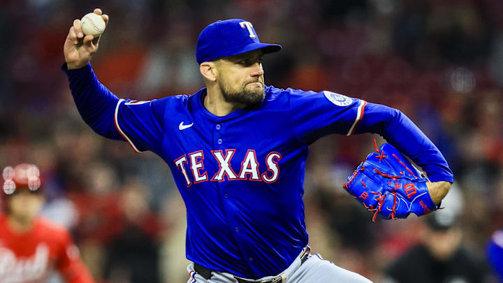 Apr 1, 2025; Cincinnati, Ohio, USA; Texas Rangers starting pitcher Nathan Eovaldi (17) pitches against the Cincinnati Reds in the ninth inning at Great American Ball Park. 