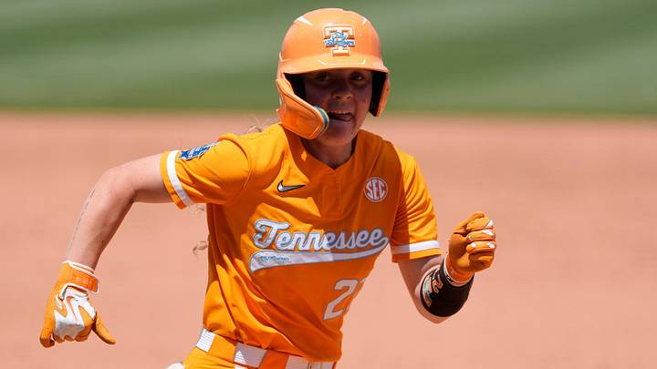 Tennessee Lady Volunteers outfielder Taelyn Holley (27) runs home to score a run in the fifth inning of a Women's College World Series softball game between the Tennessee Volunteers and the Texas Longhorns at Devon Park in Oklahoma City, Thursday, May 28, 2026. Tennessee won 6-3. Tennessee Lady Volunteers outfielder Taelyn Holley (27) runs home to score a run in the fifth inning of a Women's College World Series softball game between the Tennessee Volunteers and the Texas Longhorns at Devon Park in Oklahoma City, Thursday, May 28, 2026. Tennessee won 6-3.