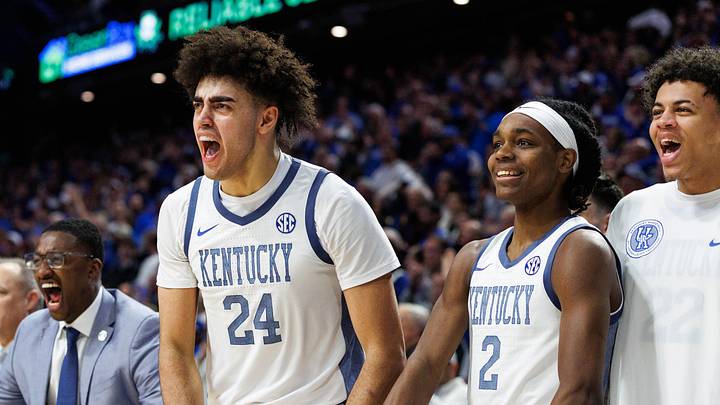 Feb 7, 2026; Lexington, Kentucky, USA; Kentucky Wildcats center Malachi Moreno (24), guard Jasper Johnson (2) and forward Braydon Hawthorne (right) celebrate from the bench during the second half against the Tennessee Volunteers at Rupp Arena at Central Bank Center. Mandatory Credit: Jordan Prather-Imagn Images