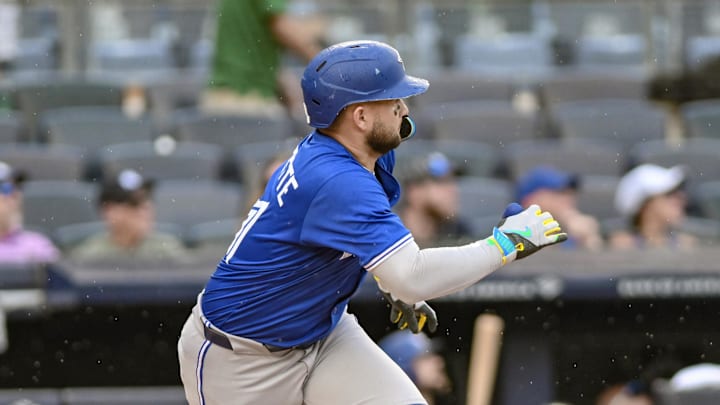 Toronto Blue Jays shortstop Bo Bichette (11) hits a double against the New York Yankees during the fifth inning at Yankee Stadium. 