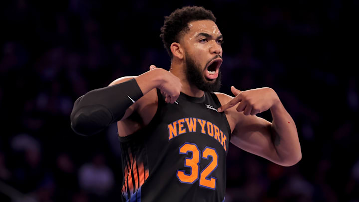 Nov 14, 2025; New York, New York, USA; New York Knicks center Karl-Anthony Towns (32) reacts during the first quarter against the Miami Heat at Madison Square Garden. Mandatory Credit: Brad Penner-Imagn Images
