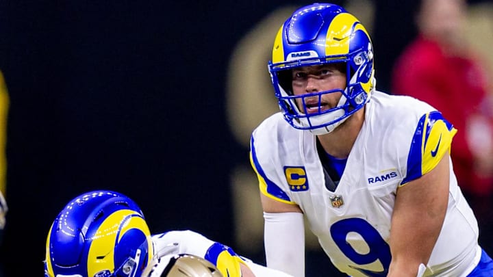 Dec 1, 2024; New Orleans, Louisiana, USA;  Los Angeles Rams quarterback Matthew Stafford (9) looks over the New Orleans Saints defense during the first half at Caesars Superdome. Mandatory Credit: Stephen Lew-Imagn Images