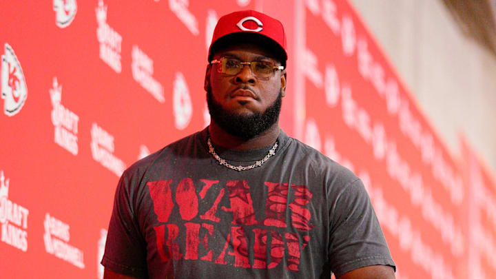 Sep 14, 2025; Kansas City, Missouri, USA; Kansas City Chiefs guard Trey Smith (65) arrives prior to the game against the Philadelphia Eagles at GEHA Field at Arrowhead Stadium. Mandatory Credit: Jay Biggerstaff-Imagn Images