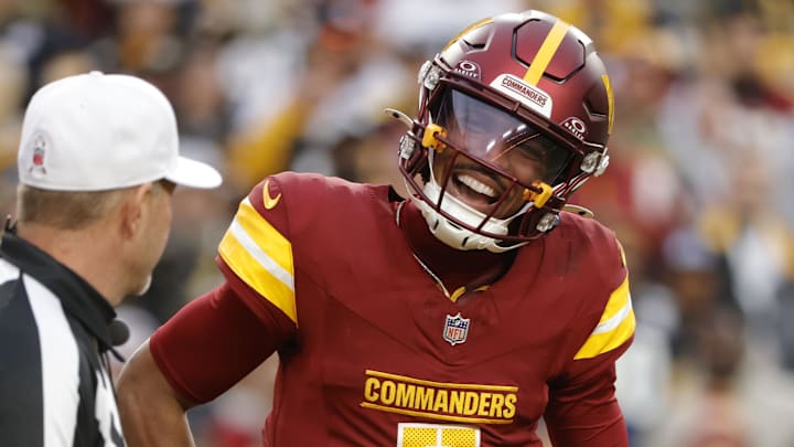 Nov 10, 2024; Landover, Maryland, USA; Washington Commanders quarterback Jayden Daniels (5) questions a call during the second half against the Pittsburgh Steelers at Northwest Stadium. Mandatory Credit: Amber Searls-Imagn Images Nov 10, 2024; Landover, Maryland, USA; Washington Commanders quarterback Jayden Daniels (5) questions a call during the second half against the Pittsburgh Steelers at Northwest Stadium. Mandatory Credit: Amber Searls-Imagn Images