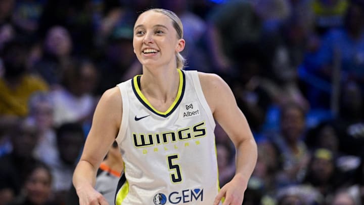 Jul 28, 2025; Arlington, Texas, USA; Dallas Wings guard Paige Bueckers (5) celebrates during the game between the Dallas Wings and the New York Liberty at College Park Center. Mandatory Credit: Jerome Miron-Imagn Images