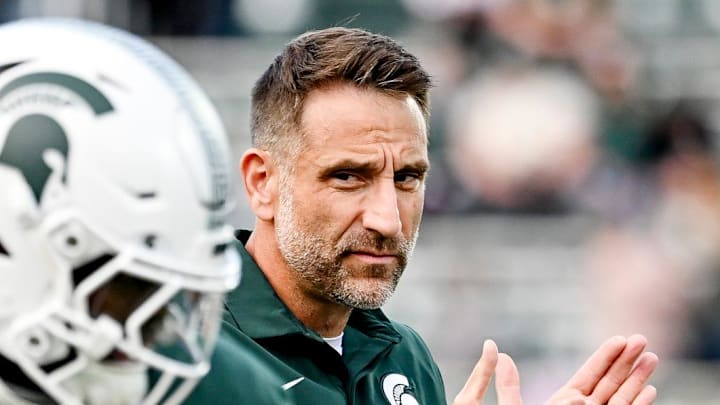 Michigan State's defensive coordinator Joe Rossi watches during warmups before the football game against Western Michigan on Friday, Aug. 29, 2025, in East Lansing. Michigan State's defensive coordinator Joe Rossi watches during warmups before the football game against Western Michigan on Friday, Aug. 29, 2025, in East Lansing.