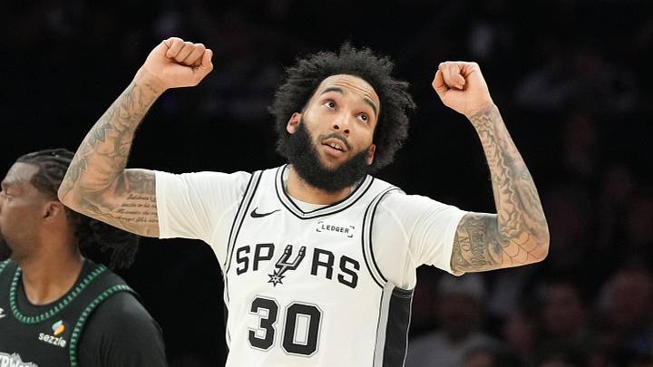 San Antonio Spurs forward Julian Champagnie (30) celebrates making a three point shot against the Minnesota Timberwolves in the second half during game six of the second round of the 2026 NBA Playoffs at Target Center on May 15, 2026.