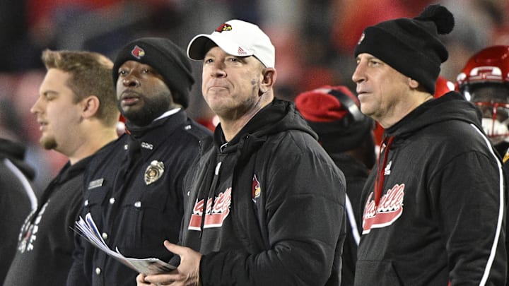 Nov 23, 2024; Louisville, Kentucky, USA;  Louisville Cardinals head coach Jeff Brohm looks toward the scoreboard during the second half against the Pittsburgh Panthers at L&N Federal Credit Union Stadium. Louisville defeated Pittsburgh 37-9. 