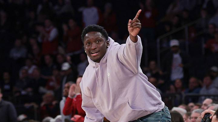 Nov 20, 2023; New York, NY, USA;  Houston Rockets guard  Victor Oladipo and former Indiana Hoosiers reacts after a play during the second half of the game between the Hoosiers and the Louisville Cardinals at Madison Square Garden. Mandatory Credit: Vincent Carchietta-USA TODAY Sports