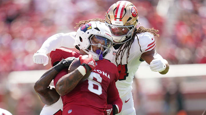 Sep 21, 2025; Santa Clara, California, USA; Arizona Cardinals running back James Conner (6) is tackled by San Francisco 49ers linebacker Dee Winters (53) during the first half at Levi's Stadium. Mandatory Credit: Cary Edmondson-Imagn Images Sep 21, 2025; Santa Clara, California, USA; Arizona Cardinals running back James Conner (6) is tackled by San Francisco 49ers linebacker Dee Winters (53) during the first half at Levi's Stadium. Mandatory Credit: Cary Edmondson-Imagn Images