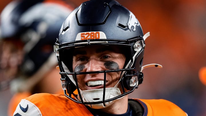 Dec 15, 2024; Denver, Colorado, USA; Denver Broncos quarterback Bo Nix (10) in the fourth quarter against the Indianapolis Colts at Empower Field at Mile High. Mandatory Credit: Isaiah J. Downing-Imagn Images