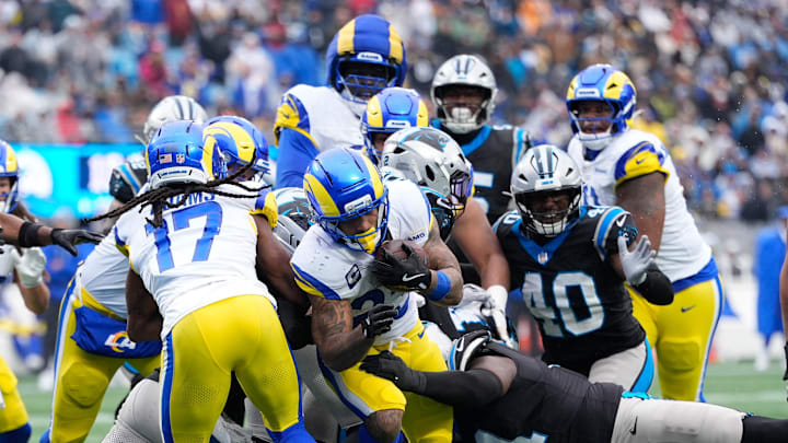 Nov 30, 2025; Charlotte, North Carolina, USA; Los Angeles Rams running back Kyren Williams (23) rushes during the fourth quarter against the Carolina Panthers at Bank of America Stadium. Mandatory Credit: Jim Dedmon-Imagn Images