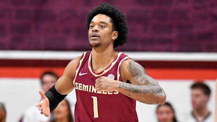 Feb 14, 2026; Blacksburg, Virginia, USA;  Florida State Seminoles guard Martin Somerville (1) celebrates a score against the Virginia Tech Hokies during the second half at Cassell Coliseum. Mandatory Credit: Brian Bishop-Imagn Images