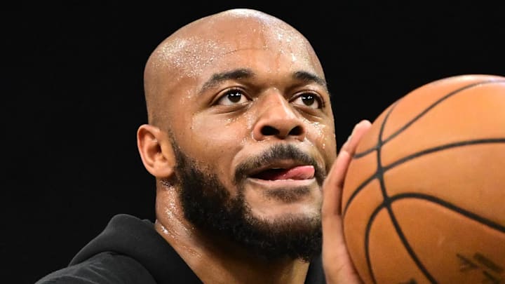 Dec 11, 2025; Milwaukee, Wisconsin, USA;  Boston Celtics center Xavier Tillman (26) warms up before the game against the Milwaukee Bucks at Fiserv Forum. Mandatory Credit: Benny Sieu-Imagn Images