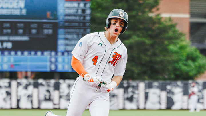 Miami Hurricanes Shortstop Jake Ogden (4) after hitting a homerun.