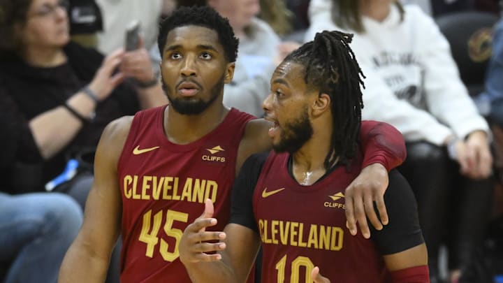 Apr 12, 2024; Cleveland, Ohio, USA; Cleveland Cavaliers guard Donovan Mitchell (45) and guard Darius Garland (10) talk in the fourth quarter against the Indiana Pacers at Rocket Mortgage FieldHouse. Mandatory Credit: David Richard-Imagn Images