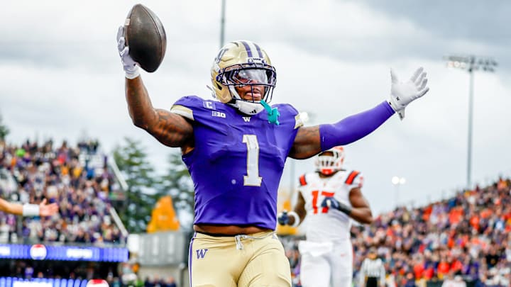 October 25, 2025, Seattle, Washington, USA: Washington Huskies running back Jonah Coleman (1) scores during the game between the Illinois Fighting Illini and the Washington Huskies in the 2025 Big 10 Conference game at Husky Stadium, Seattle, Washington.