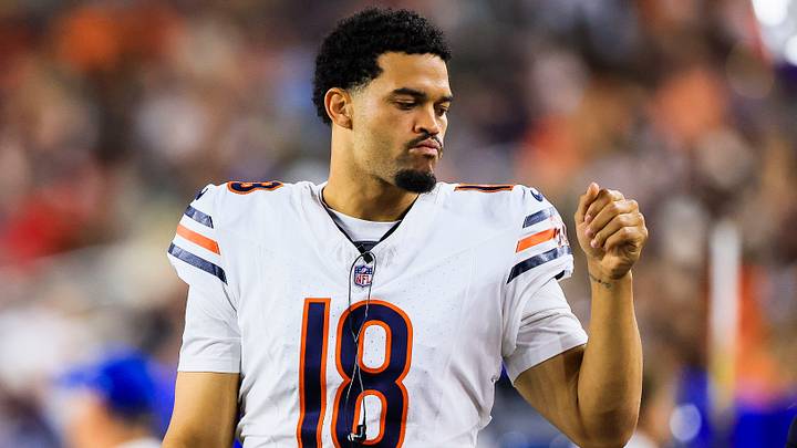 Chicago Bears quarterback Caleb Williams (18) stands on the sidelines