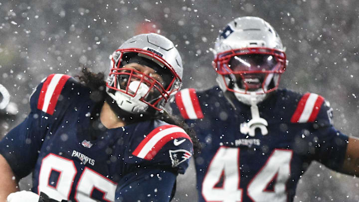 Jan 18, 2026; Foxborough, MA, USA; New England Patriots defensive lineman Khyiris Tonga (95) celebrates a sack in the fourth quarter against the New England Patriots in an AFC Divisional Round game at Gillette Stadium. Mandatory Credit: Brian Fluharty-Imagn Images
