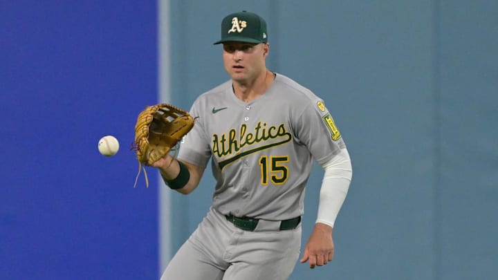May 15, 2025; Los Angeles, California, USA; Athletics center fielder Seth Brown (15) is unable to catch a single by Los Angeles Dodgers third baseman Max Muncy, not pictured, during the second inning of the game at Dodger Stadium. Mandatory Credit: Jayne Kamin-Oncea-Imagn Images May 15, 2025; Los Angeles, California, USA; Athletics center fielder Seth Brown (15) is unable to catch a single by Los Angeles Dodgers third baseman Max Muncy, not pictured, during the second inning of the game at Dodger Stadium. Mandatory Credit: Jayne Kamin-Oncea-Imagn Images