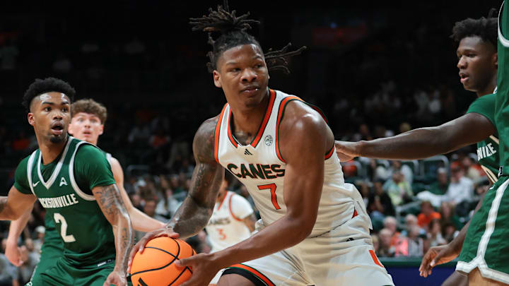 Nov 3, 2025; Coral Gables, Florida, USA; Miami Hurricanes forward Shelton Henderson (7) drives to the basket against the Jacksonville Dolphins during the first half at Watsco Center. Mandatory Credit: Sam Navarro-Imagn Images Nov 3, 2025; Coral Gables, Florida, USA; Miami Hurricanes forward Shelton Henderson (7) drives to the basket against the Jacksonville Dolphins during the first half at Watsco Center. Mandatory Credit: Sam Navarro-Imagn Images