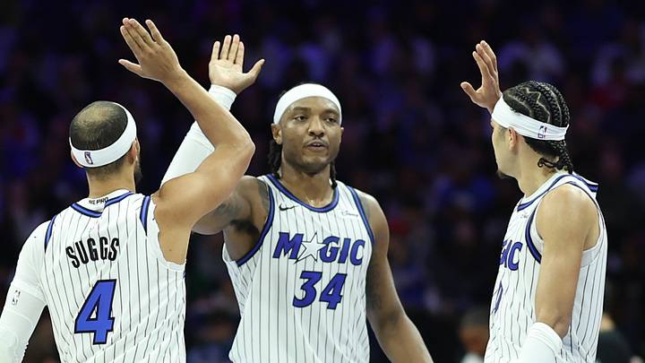 Nov 25, 2025; Philadelphia, Pennsylvania, USA; Orlando Magic guard Anthony Black (0) and center Wendell Carter Jr. (34) and guard Jalen Suggs (4) high five after a play against the Philadelphia 76ers during the second quarter at Xfinity Mobile Arena. Mandatory Credit: Bill Streicher-Imagn Images Nov 25, 2025; Philadelphia, Pennsylvania, USA; Orlando Magic guard Anthony Black (0) and center Wendell Carter Jr. (34) and guard Jalen Suggs (4) high five after a play against the Philadelphia 76ers during the second quarter at Xfinity Mobile Arena. Mandatory Credit: Bill Streicher-Imagn Images