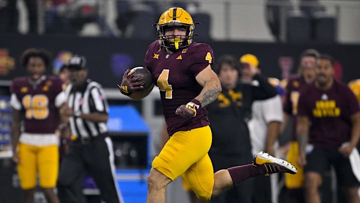 Arizona State Sun Devils running back Cam Skattebo runs with the ball against the Iowa State Cyclones.