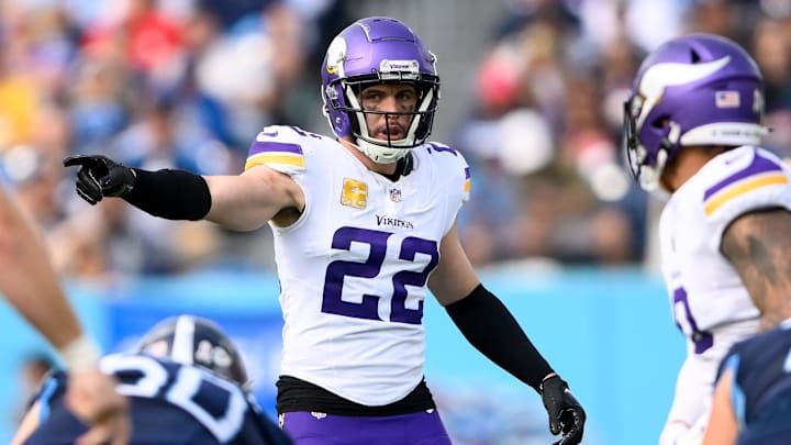 Nov 17, 2024; Nashville, Tennessee, USA; Minnesota Vikings safety Harrison Smith (22) directs the defense against the Tennessee Titans during the first half at Nissan Stadium. Nov 17, 2024; Nashville, Tennessee, USA; Minnesota Vikings safety Harrison Smith (22) directs the defense against the Tennessee Titans during the first half at Nissan Stadium.