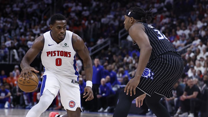 Apr 19, 2026; Detroit, Michigan, USA; Detroit Pistons center Jalen Duren (0) dribbles defended by Orlando Magic center Wendell Carter Jr. (34) in the second half during the 2026 NBA Playoffs at Little Caesars Arena. Mandatory Credit: Rick Osentoski-Imagn Images