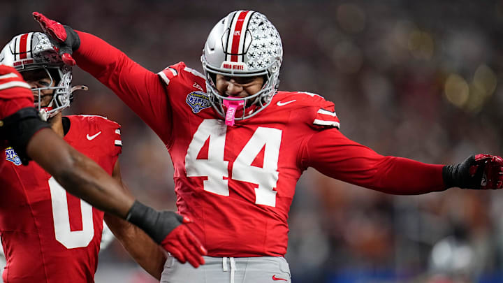 Ohio State Buckeyes defensive end JT Tuimoloau (44) and safety Sonny Styles (6) celebrates a defensive stop during the first half of the Cotton Bowl Classic College Football Playoff semifinal game against the Texas Longhorns at AT&T Stadium in Arlington, Texas on Jan. 10, 2025. Ohio State Buckeyes defensive end JT Tuimoloau (44) and safety Sonny Styles (6) celebrates a defensive stop during the first half of the Cotton Bowl Classic College Football Playoff semifinal game against the Texas Longhorns at AT&T Stadium in Arlington, Texas on Jan. 10, 2025.