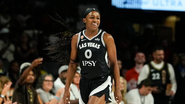 Aug 28, 2026; Las Vegas, Nevada, USA;  Las Vegas Aces guard Jackie Young (0) reacts after scoring against the Toronto Tempo during the first quarter of a WNBA basketball game at Michelob Ultra Arena.  Mandatory Credit: Lucas Peltier-Imagn Images