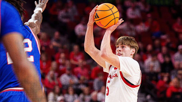 Braden Frager shoots a three-point basket against West Georgia Wolves forward Kenneth Chime during the first half.