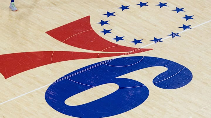 Mar 5, 2019; Philadelphia, PA, USA; Philadelphia 76ers guard Ben Simmons (25) stands by the center court logo during the third quarter against the Orlando Magic at Wells Fargo Center. Mandatory Credit: Bill Streicher-Imagn Images