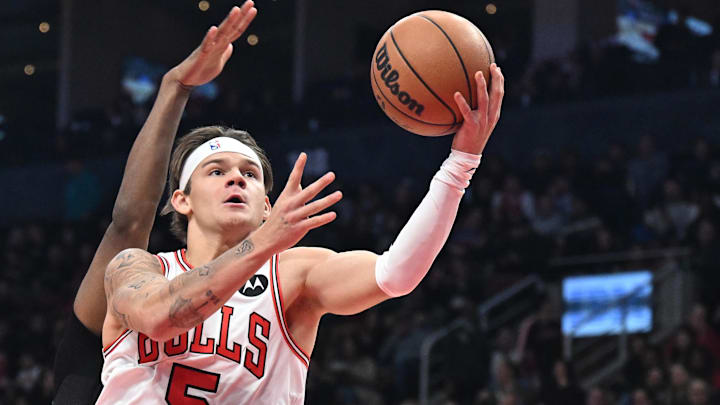 Feb 5, 2026; Toronto, Ontario, CAN;  Chicago Bulls guard Mac Mcclung (5) drives against the Toronto Raptors in the second half at Scotiabank Arena. Mandatory Credit: Dan Hamilton-Imagn Images