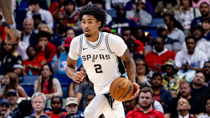 Oct 24, 2025; New Orleans, Louisiana, USA; San Antonio Spurs guard Dylan Harper (2) brings the ball up court against the New Orleans Pelicans during the first half at Smoothie King Center. Mandatory Credit: Stephen Lew-Imagn Images Oct 24, 2025; New Orleans, Louisiana, USA; San Antonio Spurs guard Dylan Harper (2) brings the ball up court against the New Orleans Pelicans during the first half at Smoothie King Center. Mandatory Credit: Stephen Lew-Imagn Images
