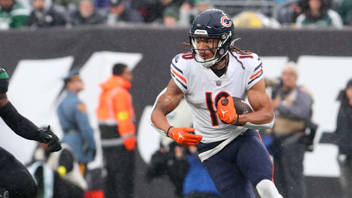 Nov 27, 2022; East Rutherford, New Jersey, USA; Chicago Bears wide receiver Chase Claypool (10) runs with the ball against the New York Jets during the first half at MetLife Stadium. Mandatory Credit: Ed Mulholland-Imagn Images