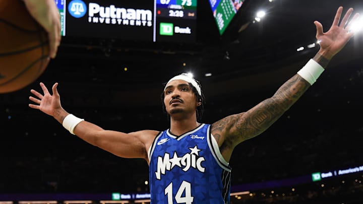 Dec 17, 2023; Boston, Massachusetts, USA;  Orlando Magic guard Gary Harris (14) defends an inbound pass during the second half against the Boston Celtics at TD Garden. Mandatory Credit: Bob DeChiara-Imagn Images