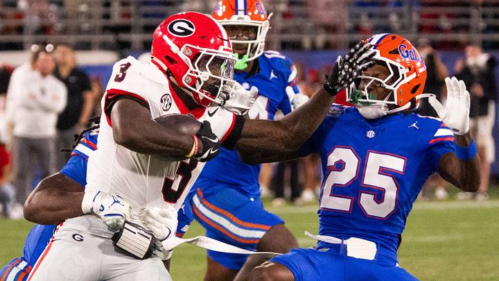 Georgia football RB Nate Frazier pushes off Florida Gators.