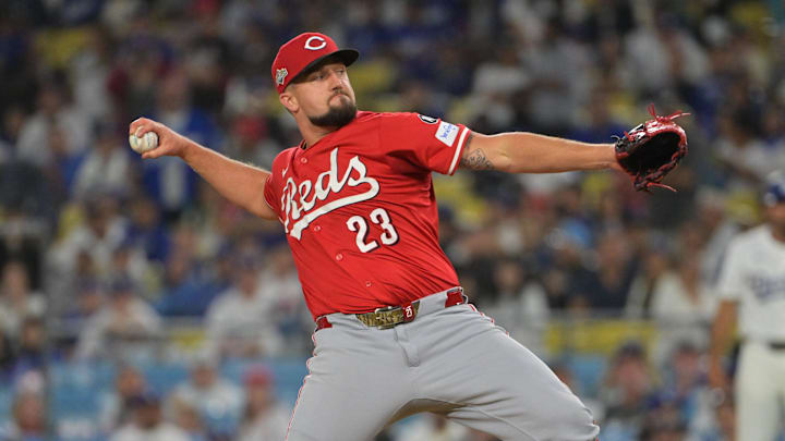 Sep 30, 2025; Los Angeles, California, USA; Cincinnati Reds relief pitcher Graham Ashcraft (23) pitches during the eighth inning against the Los Angeles Dodgers during game one of the Wildcard round for the 2025 MLB playoffs at Dodger Stadium. Mandatory Credit: Jayne Kamin-Oncea-Imagn Images