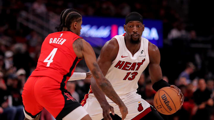 Dec 29, 2024; Houston, Texas, USA; Miami Heat center Bam Adebayo (13) handles the ball against Houston Rockets guard Jalen Green (4) during the third quarter at Toyota Center. Mandatory Credit: Erik Williams-Imagn Images
Dec 29, 2024; Houston, Texas, USA; Miami Heat center Bam Adebayo (13) handles the ball against Houston Rockets guard Jalen Green (4) during the third quarter at Toyota Center. Mandatory Credit: Erik Williams-Imagn Images