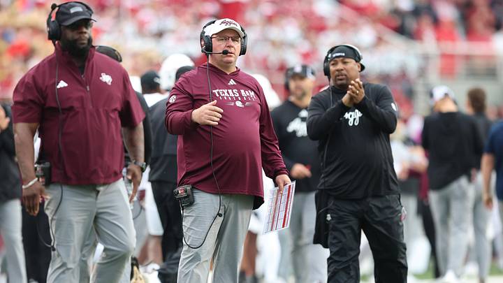 Texas A&M Aggies head coach Mike Elko during the first quarter against the Arkansas Razorbacks at Donald W. Reynolds Razorback Stadium. 