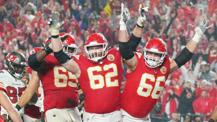 Nov 4, 2024; Kansas City, Missouri, USA; Kansas City Chiefs running back Kareem Hunt (29) scores the game-winning touchdown against the Tampa Bay Buccaneers as guard Joe Thuney (62) and guard Mike Caliendo (66) celebrate during the game at GEHA Field at Arrowhead Stadium. Mandatory Credit: Denny Medley-Imagn Images