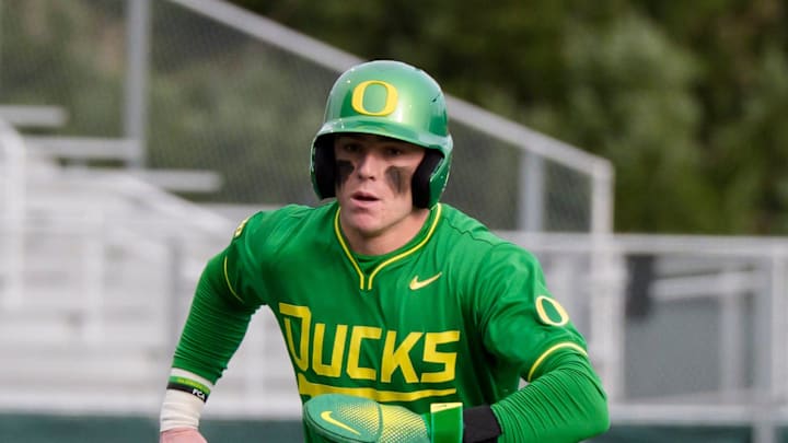 Oregon infielder/outfielder Jax Gimenez scores off an errant pitch as the Oregon Ducks host the Youngstown State Penguins on Feb. 20, 2026, at PK Park in Eugene, Oregon.